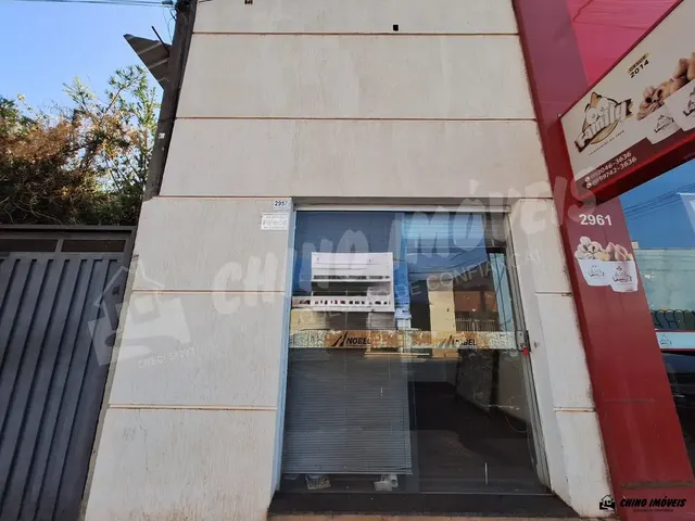 Salão comercial de aproximadamente 52m², recepção, 2 banheiros